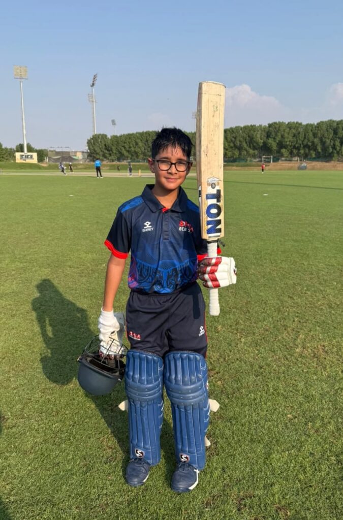 SPSA Avengers U12 batter holding his bat after a half-century in ECB Academy League Week 4